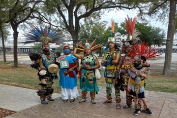 Group of people wearing colorful ceremonial dress