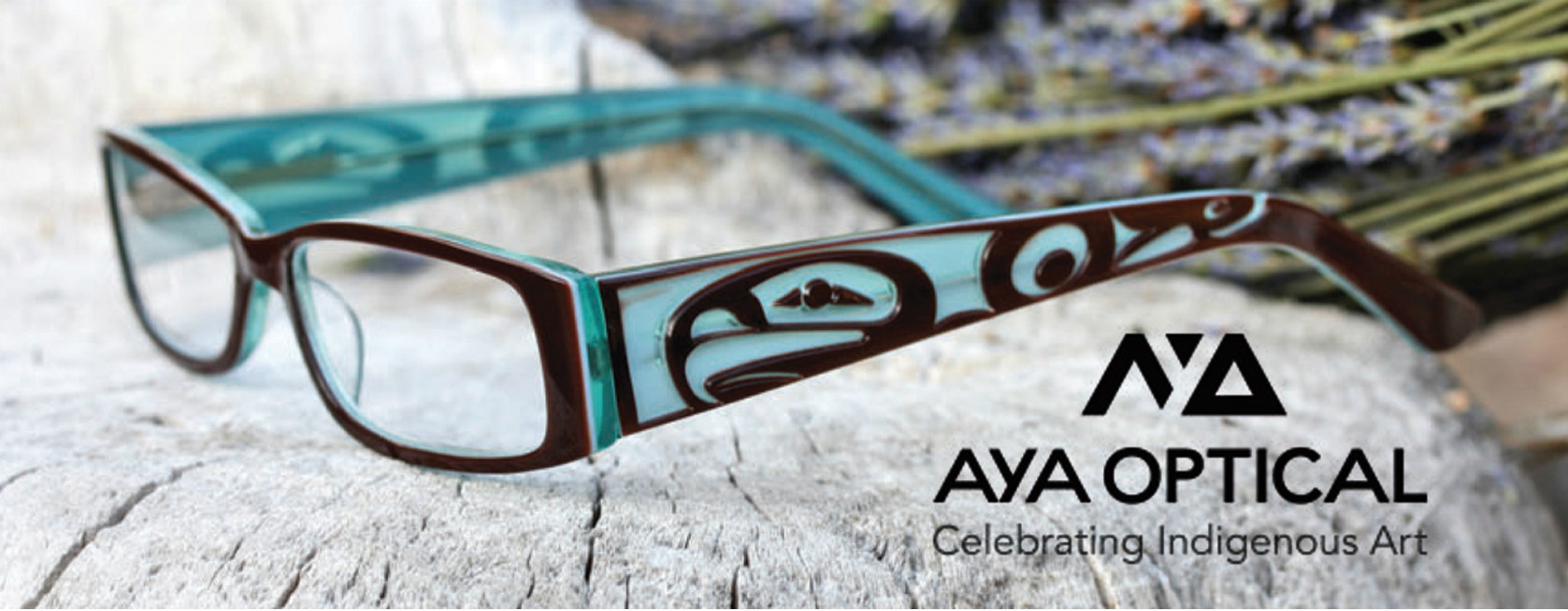 PHoto of a pair of colorful eye glasses with a blue and black native design. 