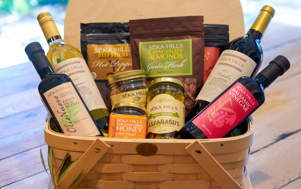 Photo of a basket full of various Seka Hills products. 